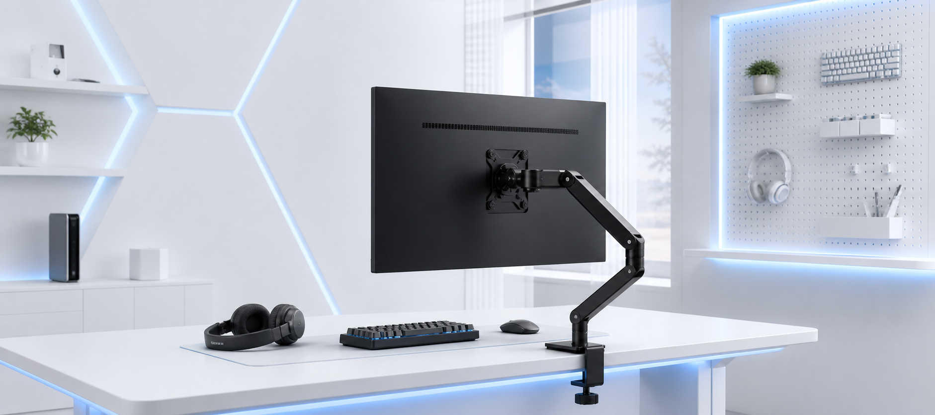AOC monitor arms in a white and blue workspace